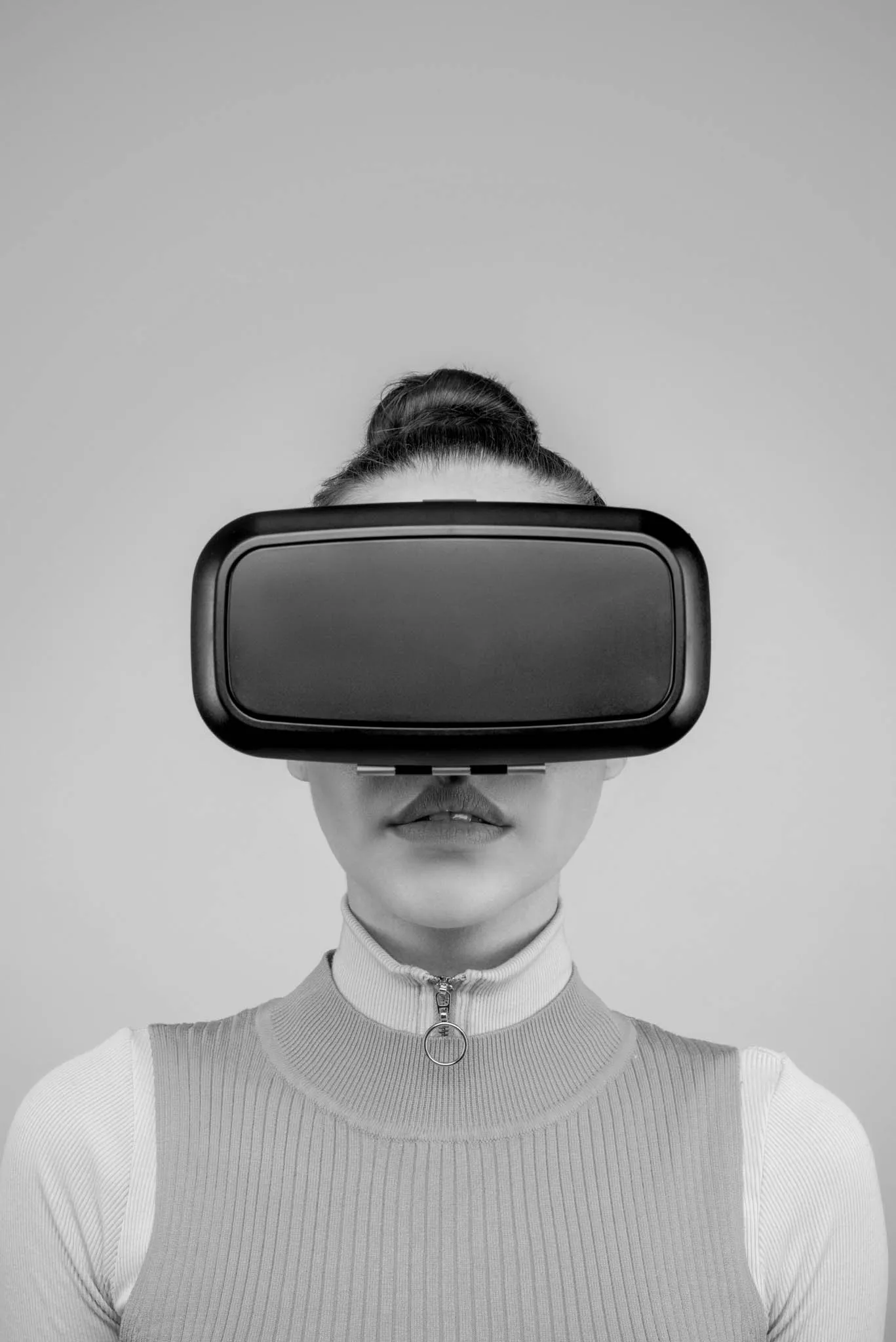 woman wearing virtual reality goggles